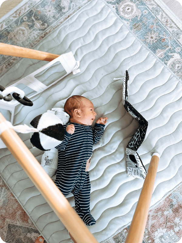 Newborn in the sidelying play position