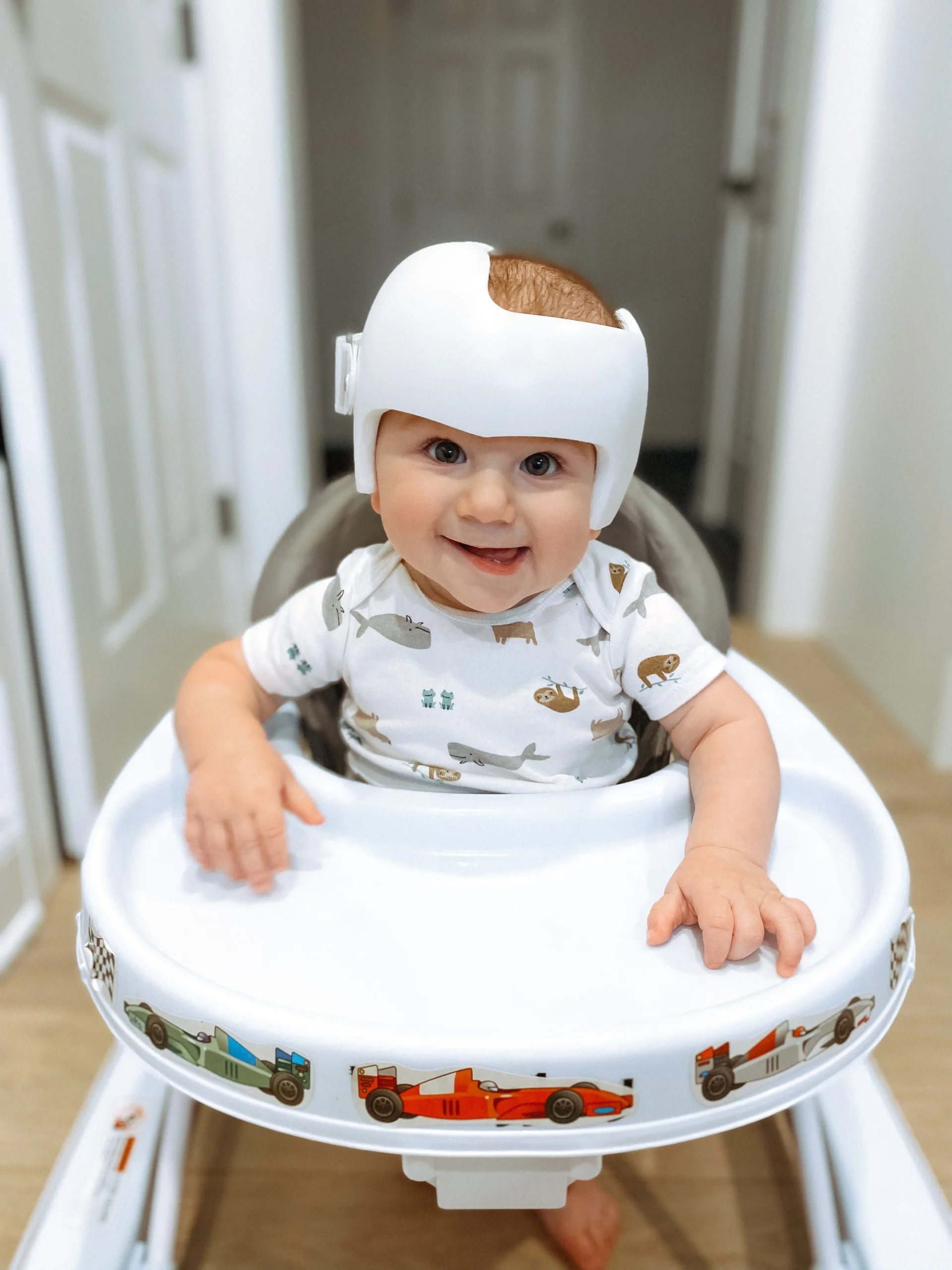  My son, Paul, 7 months, in a “sit in” walker. This is an example of a “ container ” as it is restricting movement and keeping your baby “contained.” 
