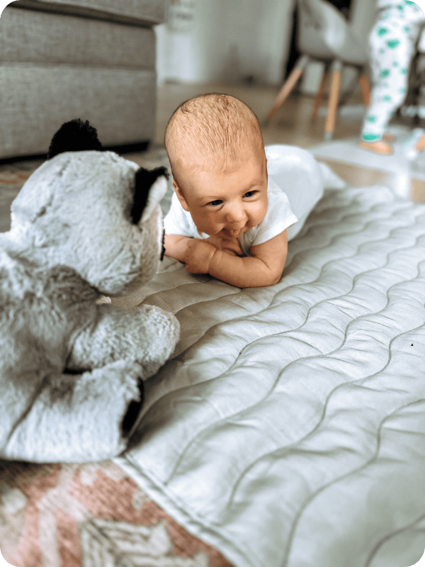 baby in tummy time on floor