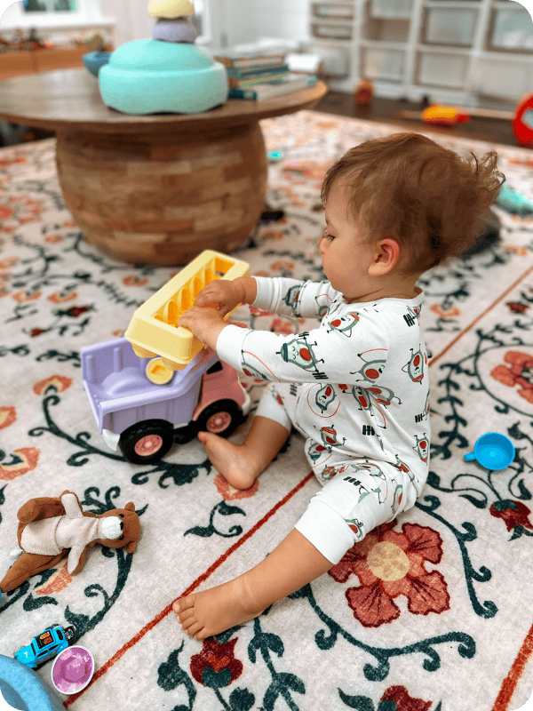 15 month old plays with toy truck