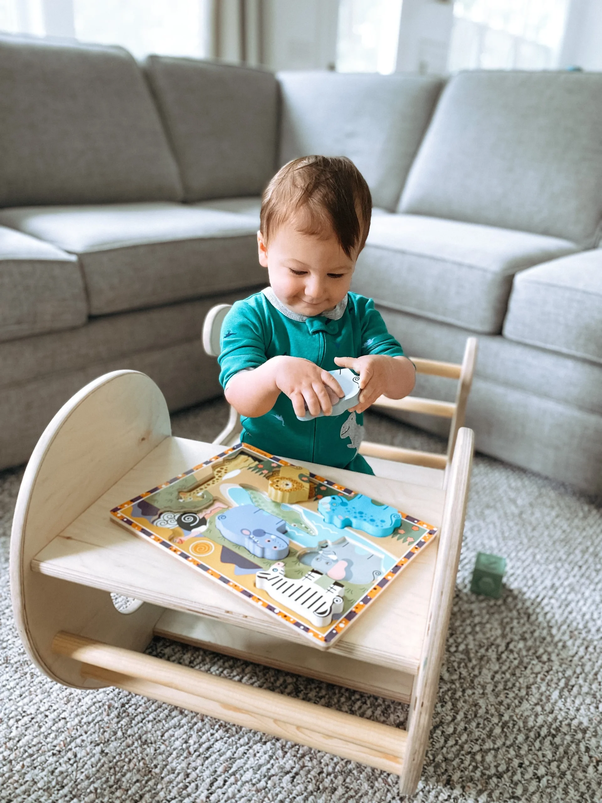  My son, Paul, 14 months, playing with a chunky puzzle.  