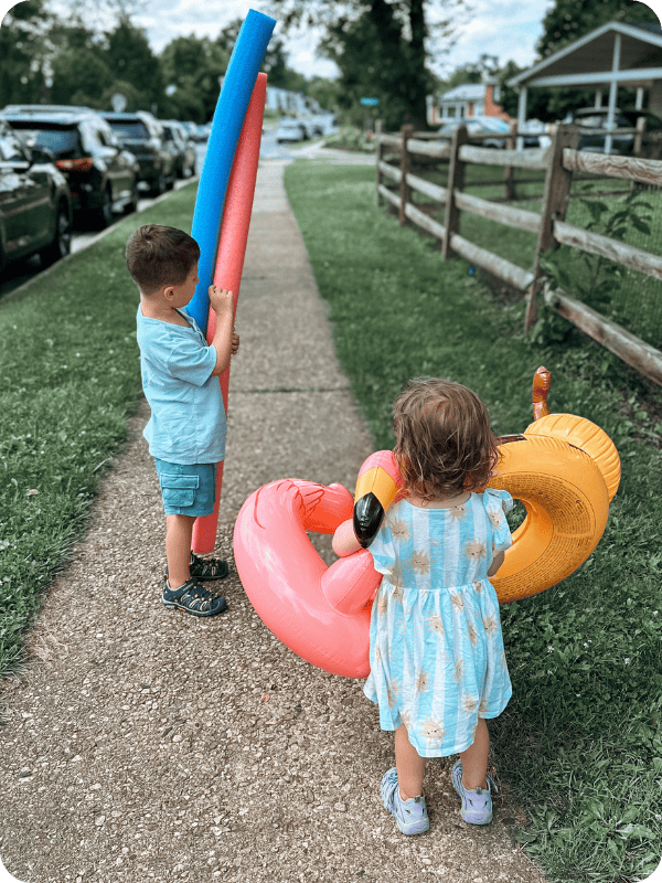 toddlers in Hobibear sandals walking to the pool