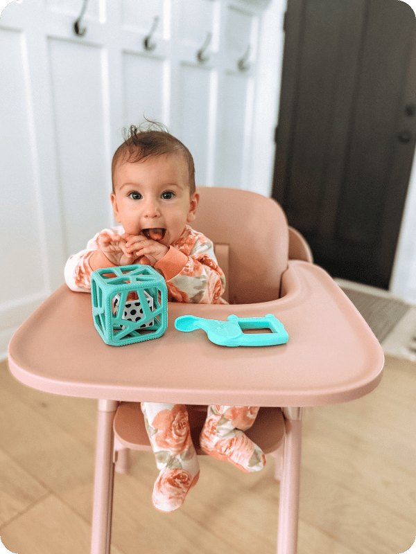 baby sitting in Lalo's high chair