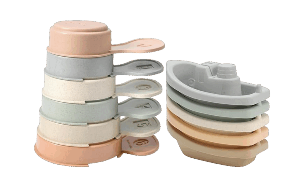 plastic bath spoons and floating boat toy for bath time play