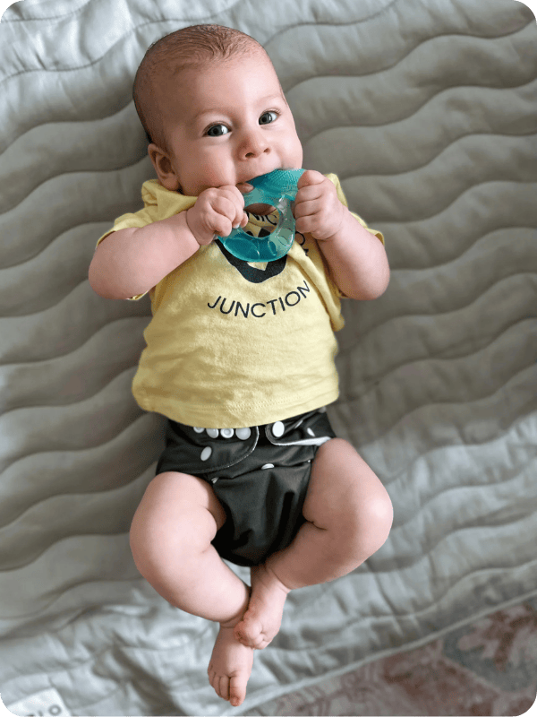 baby teething on Nuby teether