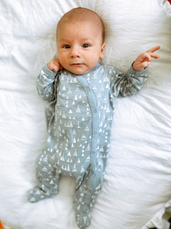 newborn baby makes eye contact with mom