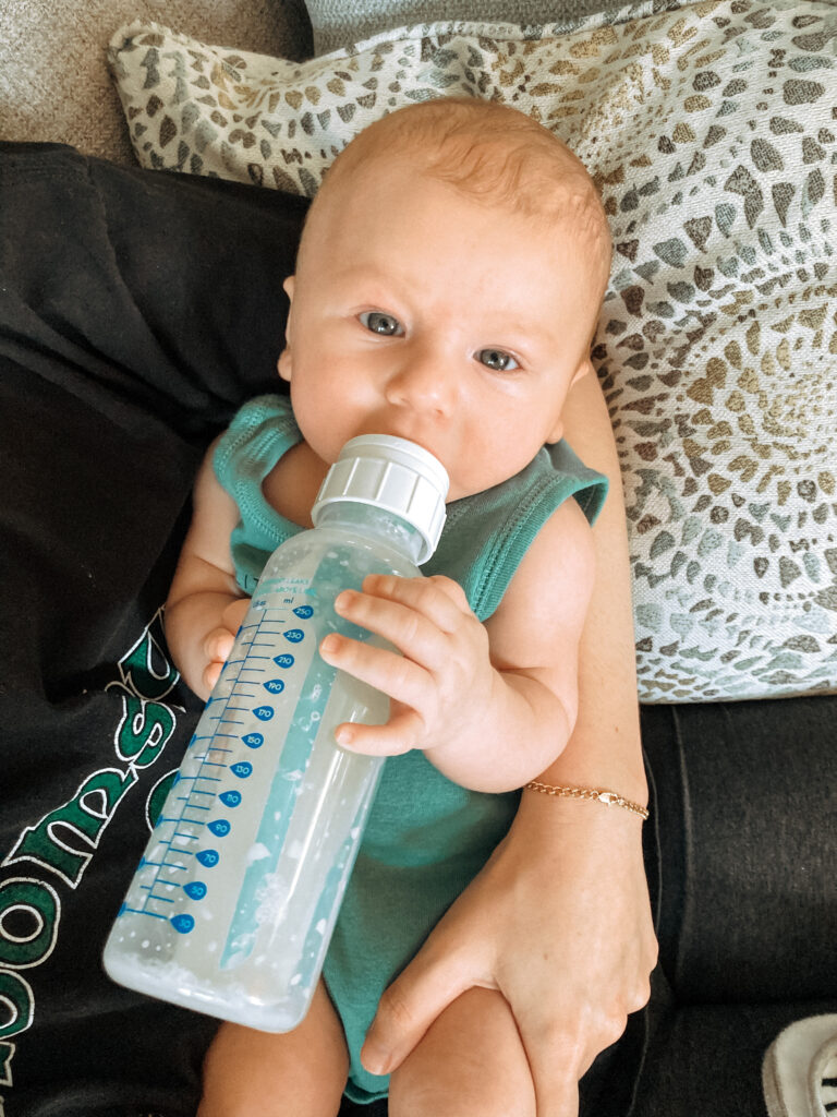 baby drinking from bottle