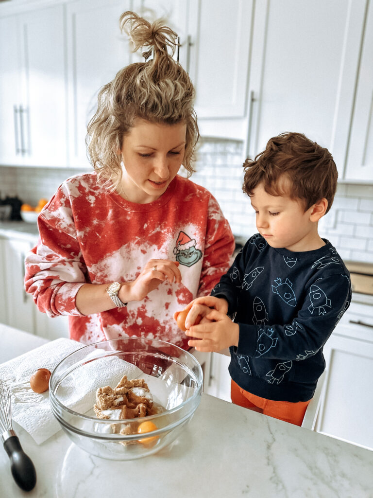 Mom and son bake cookies together