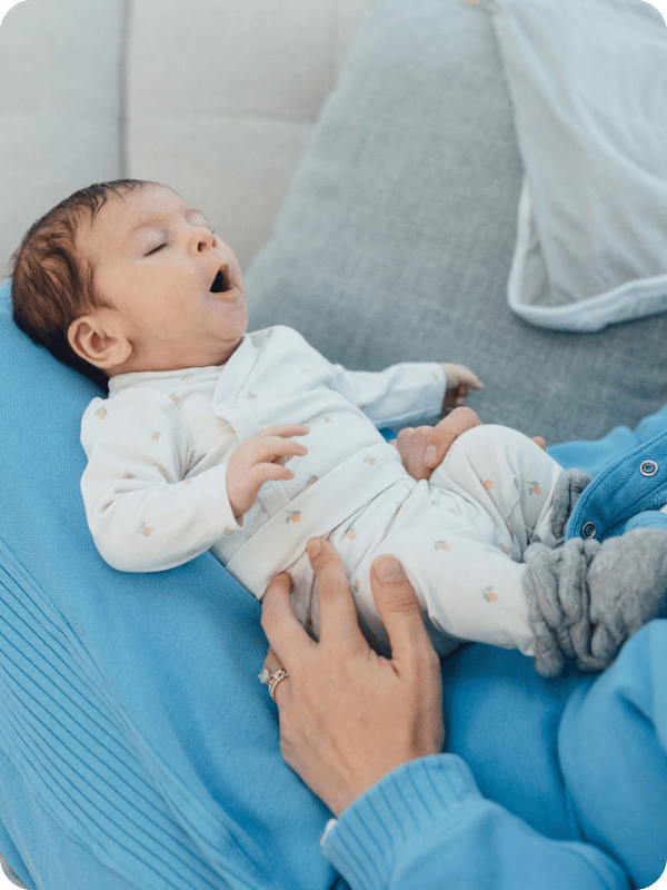 Newborn yawns before nap time