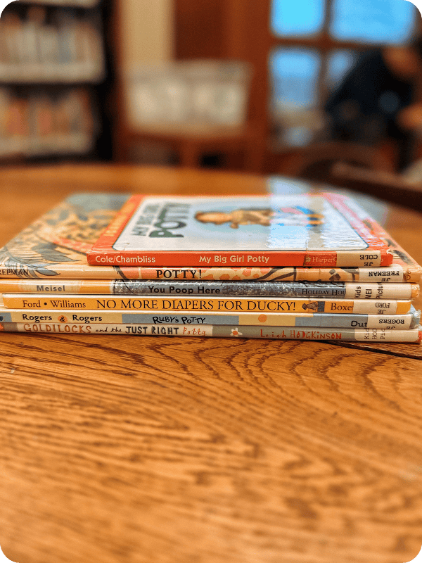 photo of potty training library books stacked up