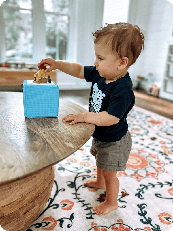 20 month old toddler playing with a toniebox