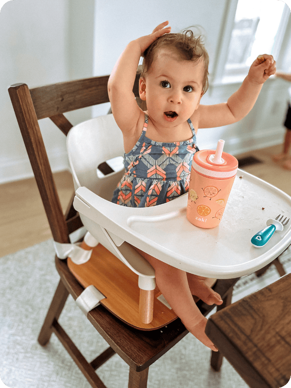 toddler girl using zak toddler water bottle