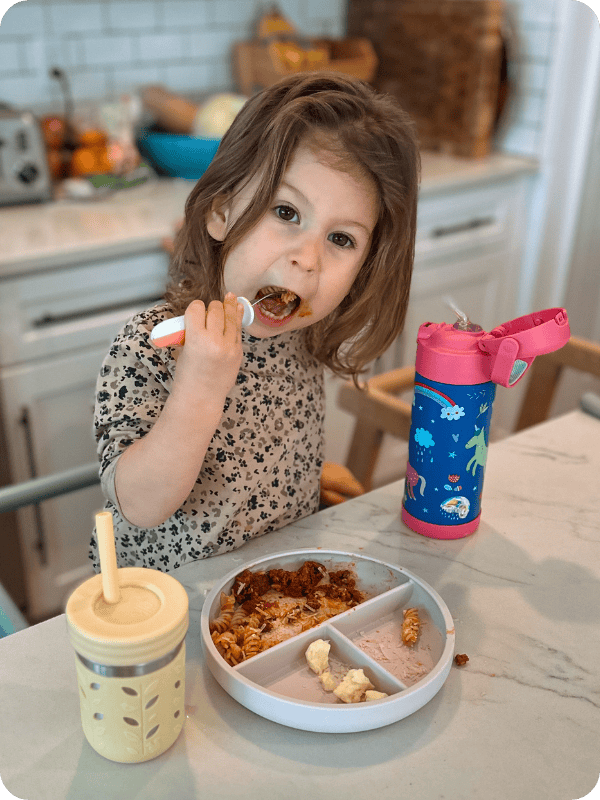 toddler eating lunch