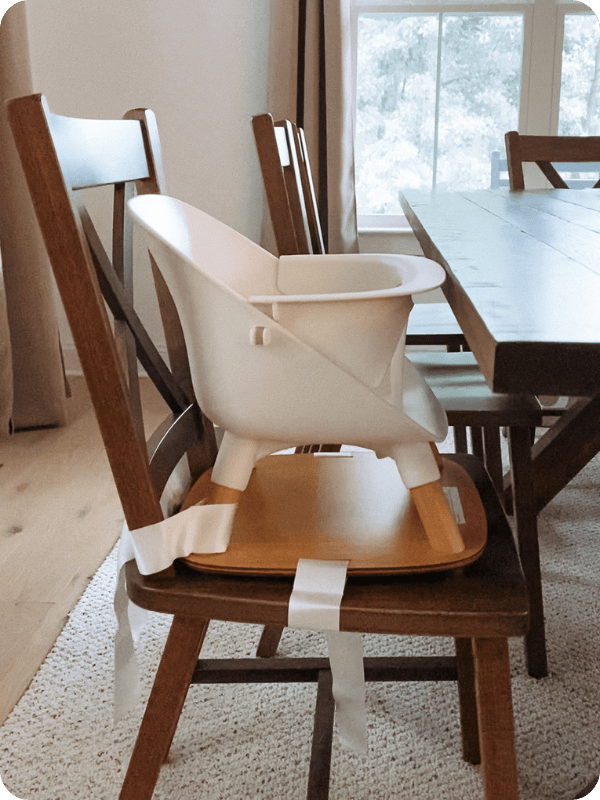 Lalo booster seat at the table