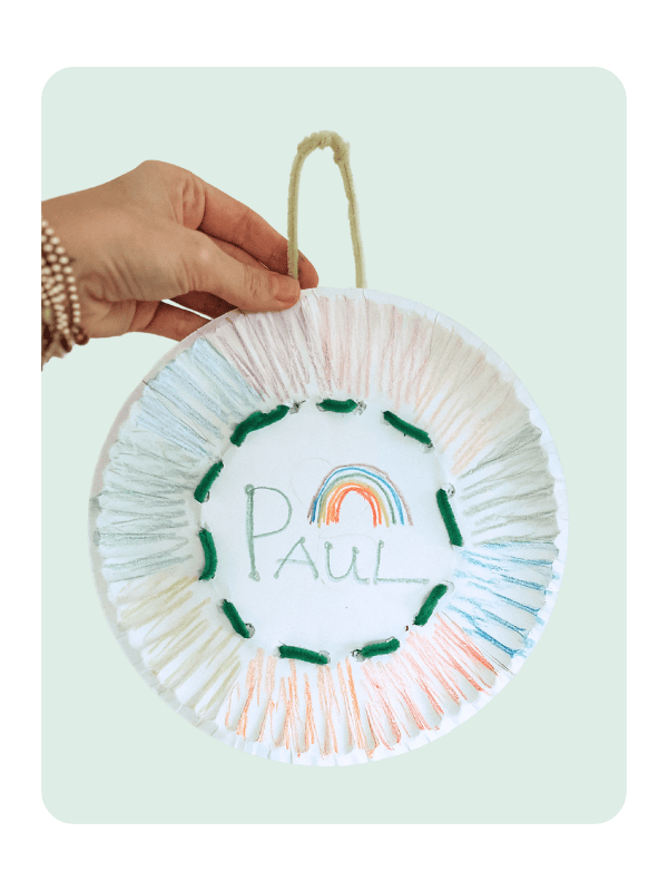 Rainbow weaver craft for toddlers.