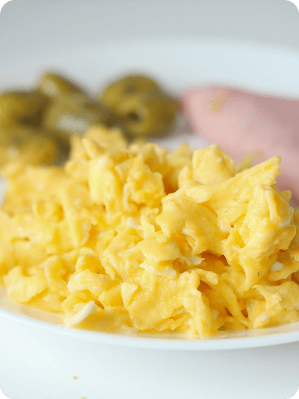 a plate of scrambled eggs