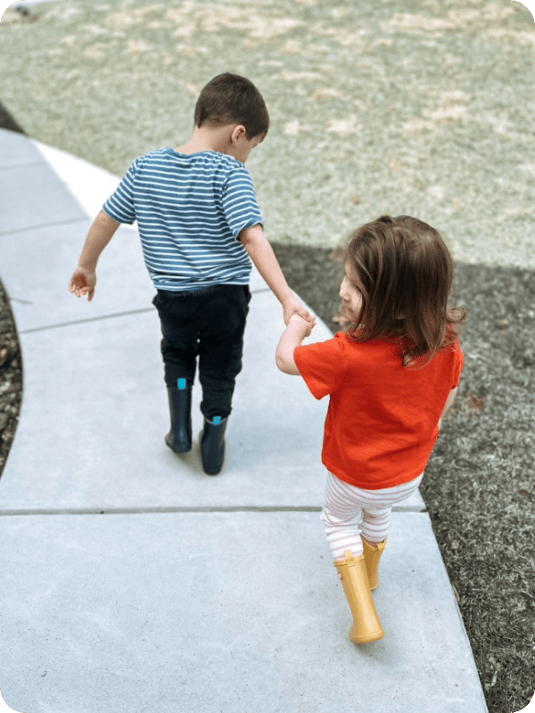 kids walking outside in rain boots