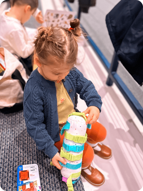 toddler girl wearing mary jane shoes at church