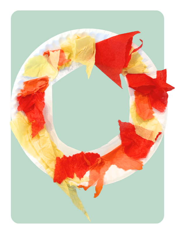 A leaf wreath craft using tissue paper and a paper plate.