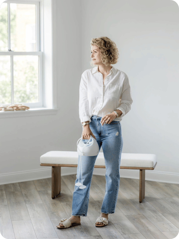 Jordyn holds her Spectra S1 breast pump.