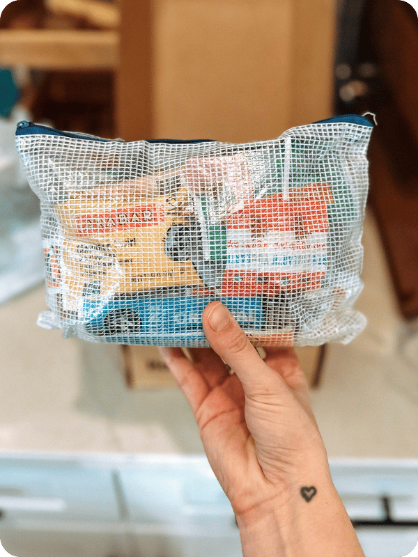 mesh zipper bags holding snacks for traveling