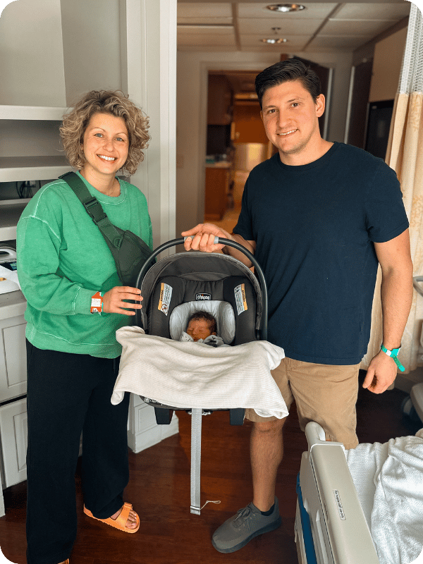 parents taking baby home from hospital in Chicco Keyfit30 infant car seat