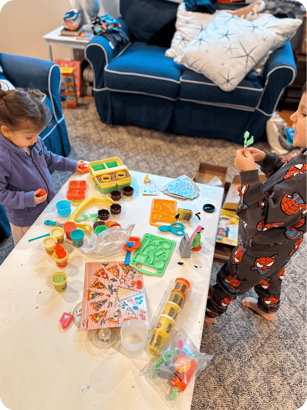 children playing with play-doh sets