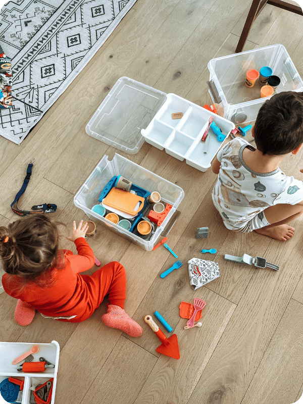 children playing with play-doh sets