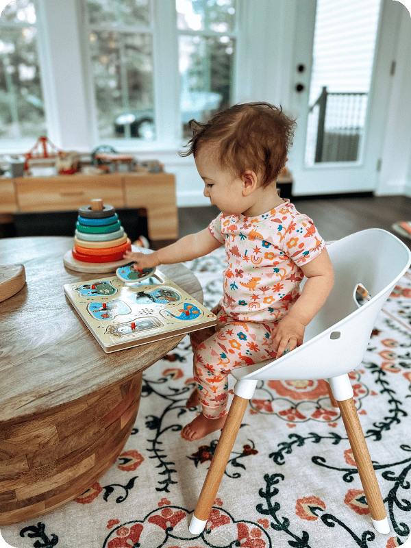 toddler playing with puzzle